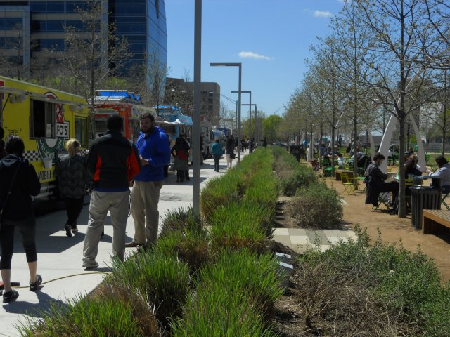 Lidding I-5 in Downtown Seattle: Site Analysis and Interim Solutions Klyde Warren's Park's street edges are activated with food trucks, clear sight lines, and flexible seating. (Photo by the author)