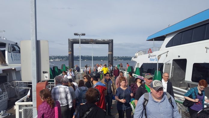 20170710_084108 Passengers on Colman Dock with a ferry docked.