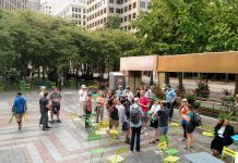 Subscriber Drive: The Urbanist Development Team’s 2018 Accomplishments A few dozen people gather at Westlake Park for The Urbanist's Center City walking tour.