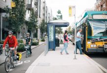 Service Changes Coming to Local Transit Agencies Starting March 20th A floating bus stop and protected bike lane on Dexter Avenue. (Photo by Adam Coppola)