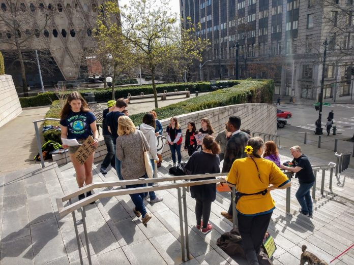 Youth Climate Protest at Seattle City Hall Youth climate activists organized the first Fridays for the Future rally on March 22, 2019. District 4 City Council candidate Shaun Scott attended and gave a brief talk encouraging activists. (Photo by author)