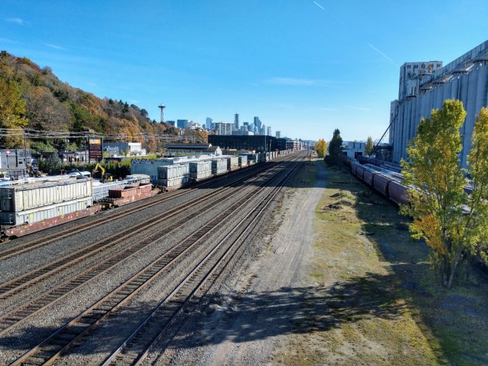 Tracks with Seattle Skyline BNSF Railways track heading into Downtown Seattle from Interbay. (Credit: Doug Trumm)