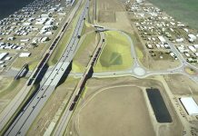 Legislature Authorizes $10 Billion in Highway Spending Rendering of I-395 interchange with pond. (WSDOT)