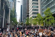 MLK County Labor Council Expels Seattle Police Guild as Contract Showdown Looms The view of Fifth Avenue with a cordon of police officers brandishing billy clubs protecting the block in front of city hall and a stream of protests headed down James Street.