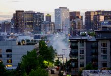 Where Urbanists and Progressives Go from Poor 2021 Showing Tear gas rises near the East Precinct building on E. Pine St. on Monday, May 1, as police disperse a crowd of protestors. (Photo by Ethan Campbell)