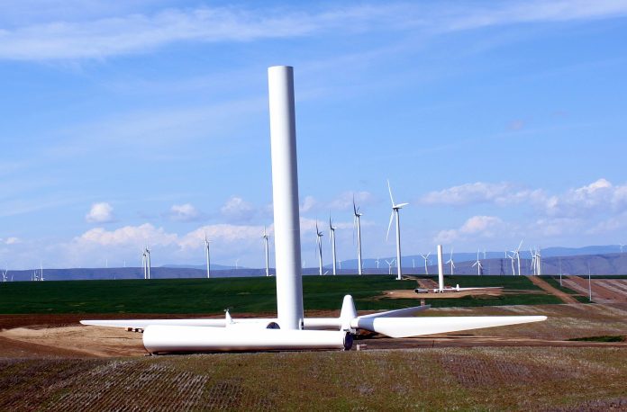 1642px-Biglow_Canyon_Wind_Farm_under_construction Wind turbines with one half-constructed turbine in the foreground.