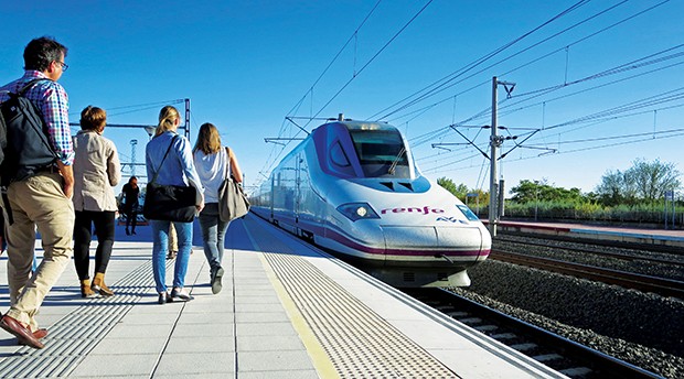 An ultra-high-speed train pulls into a passenger station in Europe. Photo courtesy Midwest High Speed Rail Association. An high-speed train pulls into a station and passengers approach. (Photo courtesy Midwest High Speed Rail Association)