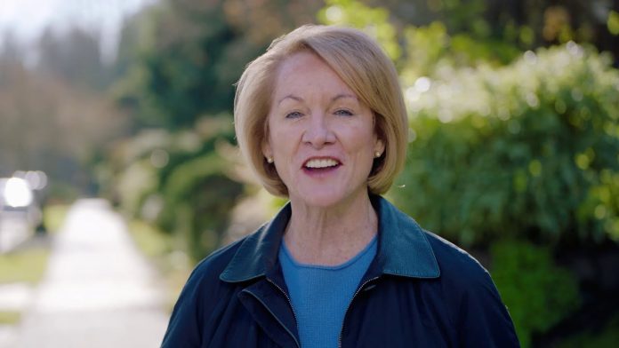 Durkan Announces She is Not Running for Reelection, Opening Floodgates in Mayoral Race Mayor Durkan stands on a sidewalk on a leafy residential block.