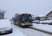 Transit Agencies Waive Fares on New Years Eve A Metro bus operating on a snowy Beacon Hill. (Owen Pickford)