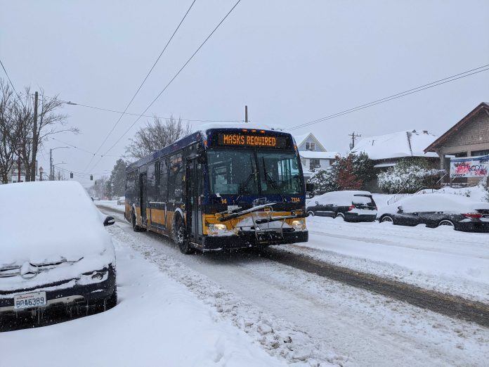 PXL_20210213_181252003.MP (1) A Metro bus operating on a snowy Beacon Hill. (Owen Pickford)