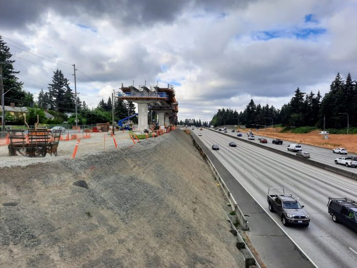 130th Street Station construction A light rail guideway rises on the edge of the I-5 freeway trench at the 130th Street overpass in Seattle.