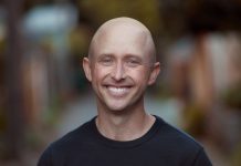 Urbanist Supervolunteer Ron Davis Jumps In D4 Council Race to Replace Alex Pedersen Image description: Ron is a bald White man wearing a black shirt and a smile.