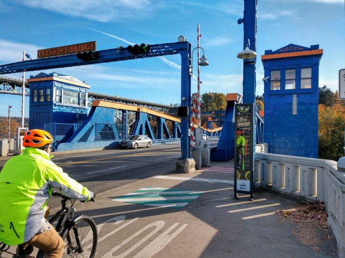 Fremont bridge with person biking