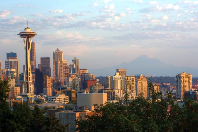 15395102019_af72fd714f_b A photograph showing the skyline Downtown Seattle's tall buildings at sunset as viewed from Kerry Park in Queen Anne.