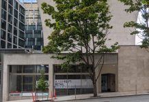 Seattle to Boost Downtown with Additional Street-Level Uses A sign says 4,128 square feet of retail are available.