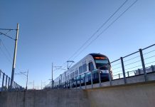 Publication Update: Fall 2021 Subscriber Drive Edition A photo of a light rail train on an elevated rail line.