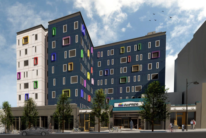 Pride Place Community Roots Housing A rendering of a "L" shaped seven story apartment building. Three quarters of the exterior of the building is dark grey, while one quarter is white. The windows are surrounded by frames in many different vibrant colors.