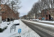 Seattle Needs a Truly Multimodal Snow Clearance Plan A view of Stone Way from the 38th crosswalk. Nothing is cleared but one car travel lane in each direction.
