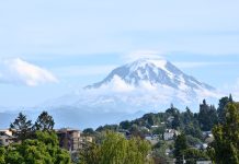 Seattle’s Geologic Hazards Can Be Overwhelming, But Preparation Can Start Now A view of a mountain in the distance behind a suburban neighborhood