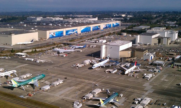 An aerial photo of Boeing's sprawling Everett manufacturing plan with planes sitting on the tarmac.