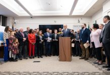 State Road Safety Push Overlooks Design, Dwells on Enforcement Governor Inslee stood at the podium at the Captiol with dozens of legislators and stakeholders behind him.