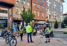 Tickets Going Fast for Seattle Housing Panel and Other Urbanist Events A dozen people gather in the courtyard plaza between the buildings that compose El Centro de La Raza complex.