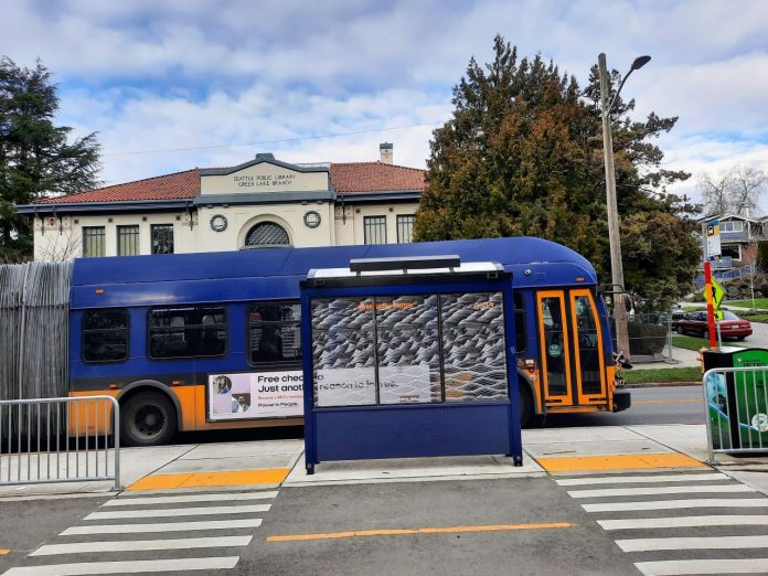Green Lake Library with bus at busstop