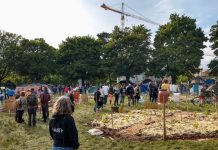 Seattle Parks Seeks Erasure of the Black Lives Memorial Garden Around 30 people milled about the a garden with early plantings.