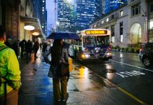 America’s Pessimism Isn’t Economic, Stupid – It’s Human A rainy downtown Seattle street scene with bus 590 approaching.