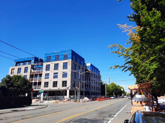 New condos on Phinney by Doug Trumm 20210921 A five-story mixed-use brick building under construction on Phinney Avenue.