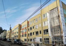 ‘Housing Accountability Act’ Seeks to Push Local Governments to Boost Homebuilding A large four-story apartment building under construction.