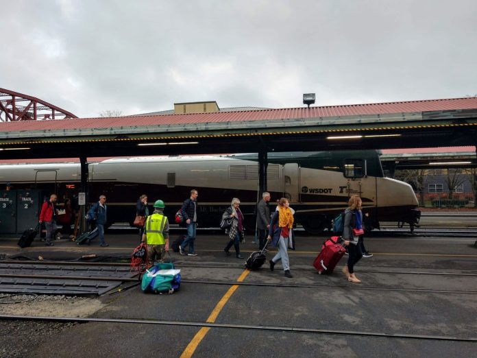 Amtrak Cascades passengers at Portland Union Station 20191213 Passengers deboarding an Amtrak train at Portland's Union Station.