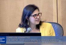 Seattle Land Use Committee Rejects Morales’ Equitable Development Bill Morales wears a yellow blazer and glasses.