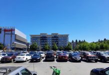 Why Climate Advocates Should Be Urbanists, Part 2 A parking lot on a hot day in Northgate, with Thornton Place behind