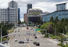 Get Your Tickets for ‘Urbanism on the Eastside’ Panel July 6th A high angle view of wide, car-choked 8th Avenue looking toward I-405 and the towers of Downtown Bellevue.