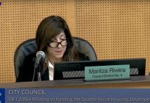 Seattle Council Puts Competing Measure Against Social Housing on February Ballot Rivera sits at the dais at council chambers.