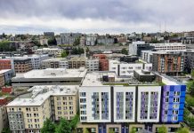 Policy Lab: Cracking Down on Rental “Junk Fees” An rooftop view of rows of midrise apartments in South Lake Union with Capitol Hill in the distance.