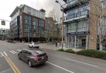 Join for Final Urbanist Happy Hour of 2024 on December 17th The Space Needle peeks over the top of midrise rooftops