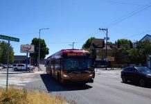 24/7 Aurora Bus Lanes to Keep Riders Moving During I-5 Overhaul An E Line bus heads northbound on Aurora Avenue N near Green Lake on a sunny day.