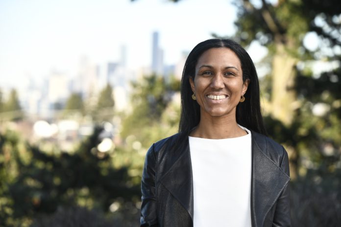 Dionne Foster with Seattle skyline