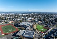 Tacoma Rezone Offers Housing Diversity and Path to Breaking Car Dependence An aerial shot of North Tacoma neighborhoods with Mount Rainier and the Tacoma Dome in the distance.