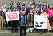 Op-Ed: Why Housing Supply Advocates Should Support Rent Stabilization A group of about about 30 advocates stands on the Capitol steps.