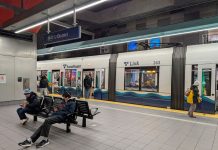 1 Line Light Rail Faces Weekend Maintenance Closures Starting November 8 Some passengers catch a northbound train at U District Station while other wait on seats for the southbound.