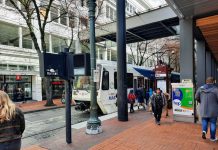 Op-Ed: Clark County Rallies Against Republican Plan to Block Light Rail A handful of passenger wait or deboard a MAX light rail train on Morrison Street in Downtown Portland.