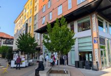 Join The Urbanist for June Events, Eastside Forum on July 6th A line forms out the door into the plaza at El Centro de la Raza.
