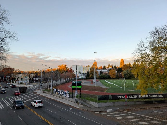 The view from the Mount Baker pedestrian bridge with the Franklin football field at the corner of MLK Way and Rainier Avenue.