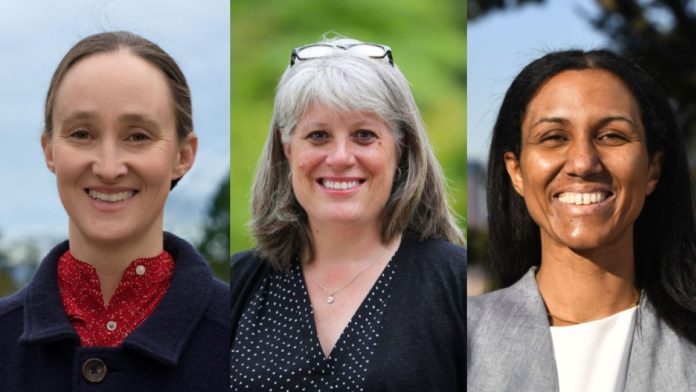 Pictured right to left, Wilson is a white woman with her hair pulled back. Balducci is a white woman with gray hair and her glasses on her head. Foster is a black woman in a gray blazer.