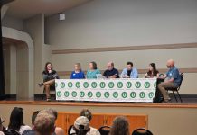 Join Us for Our January Socials and North Sound Election Debrief The six panelists sit at a table with the Urbanist U logo on it and Ryna Packer is off to the side moderating.
